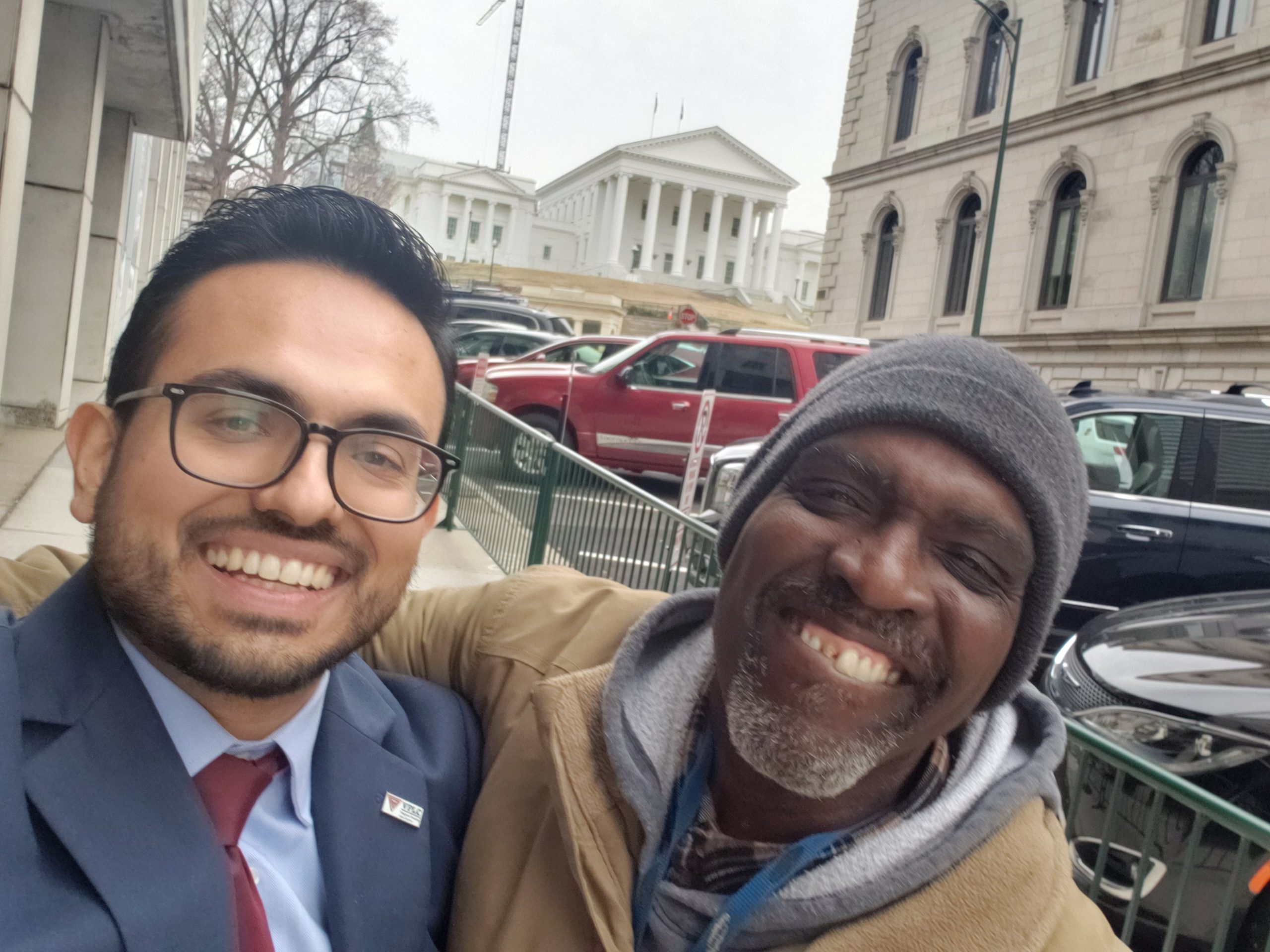 Salaam Bhatti with Carl Phillips after testifying for repeal of drug felony ban